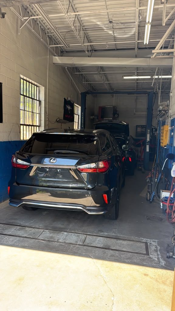 Lexus on the lift at the GP Auto shop